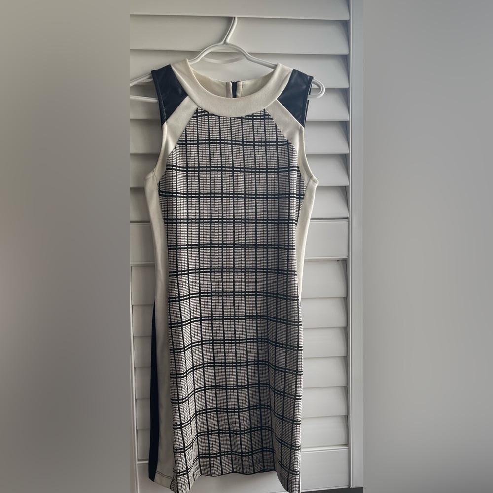 Lightly used FEMME knee length dress small size